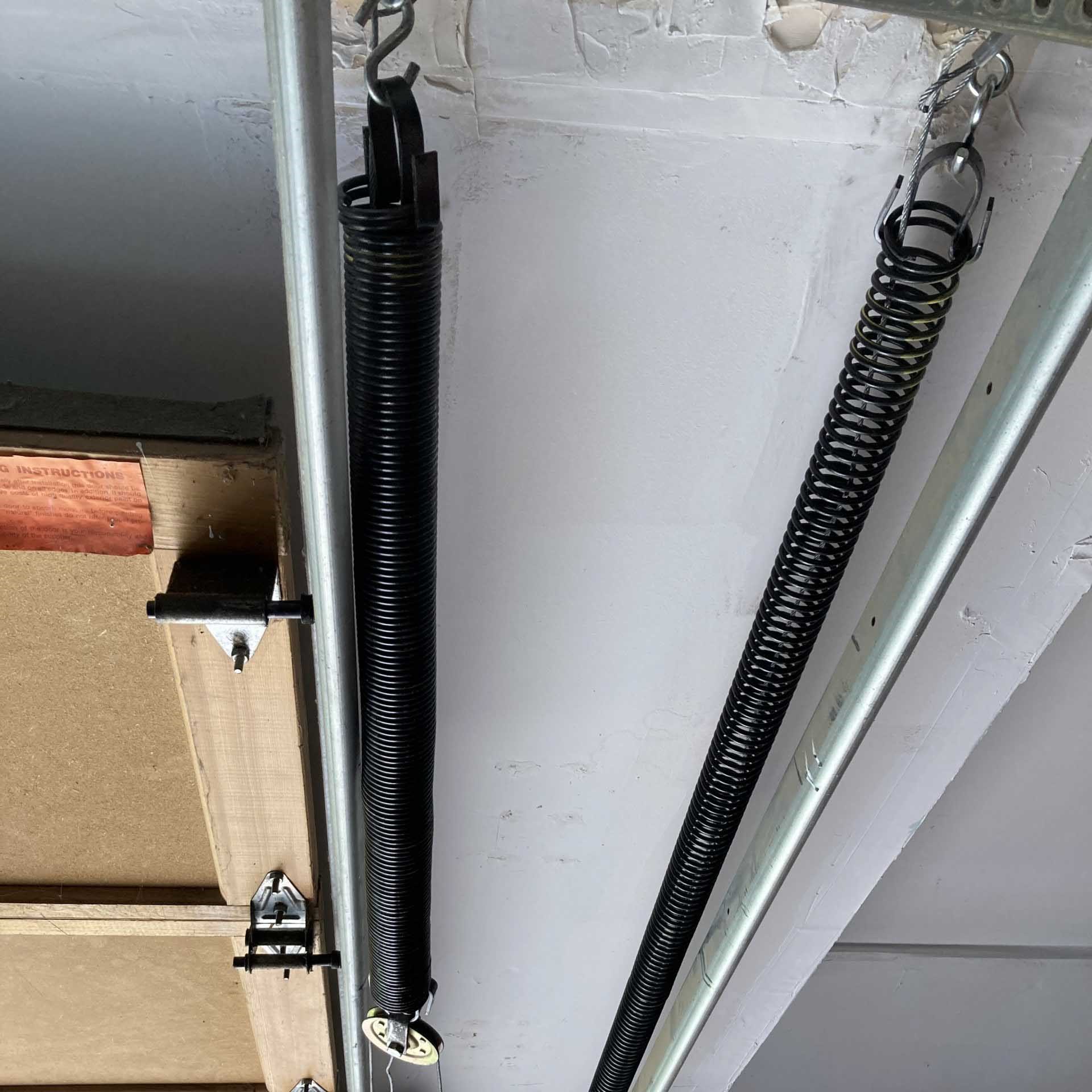 Húzórugó | garázskapu Húzórugó | garázskapu