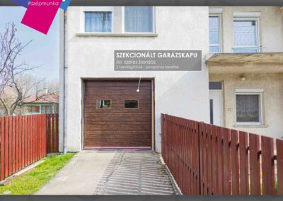 Ravázdi szekcionált garázskapu dió színű, 2 ablakos, szélesbordás kivitelben